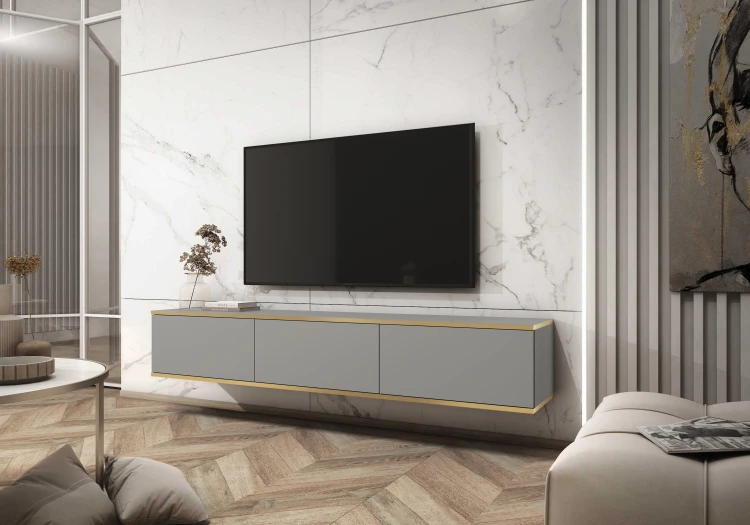Aranżacja nowoczesnego salonu z wiszącą szarą szafką pod telewizor Oro RTV175, gładkie fronty i złote obrzeże, szerokość 175 cm