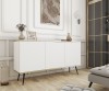 Biała komoda glamour Oro K160 na czarnych nogach w eleganckim salonie