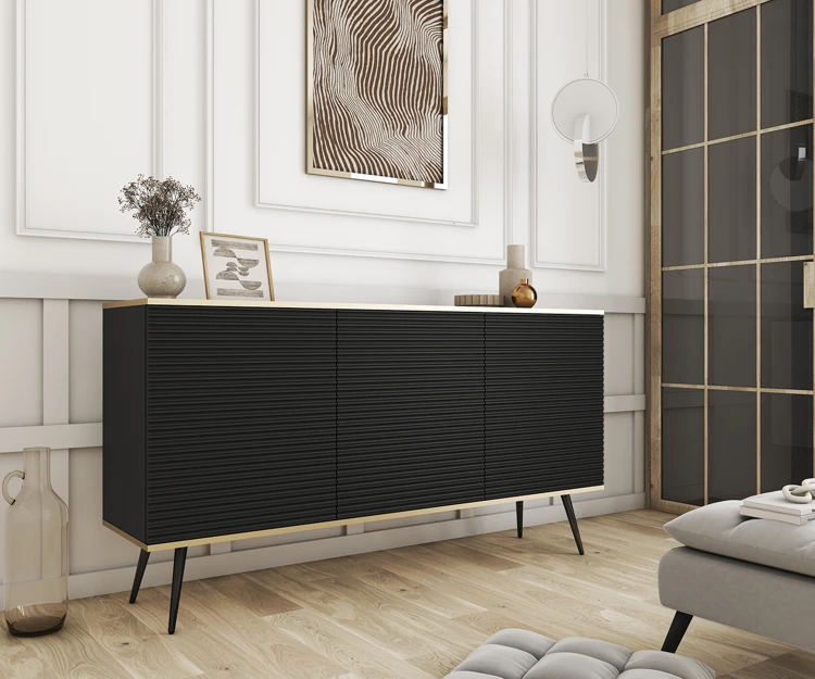 Czarna komoda glamour Oro K160 MDF na czarnych nogach w eleganckim salonie