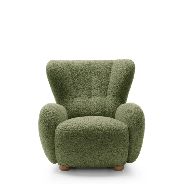 Zielony fotel wypoczynkowy Ciro boucle prezentujący nowoczesny, obły design i wysokie oparcie.