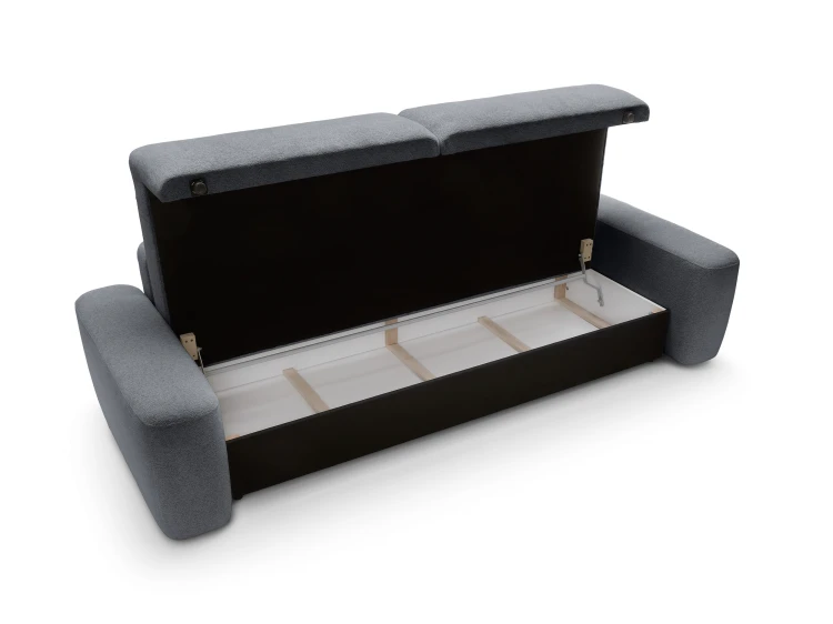Sofa Bouli z uniesionym siedziskiem ukazująca praktyczny schowek na pościel wewnątrz bryły.