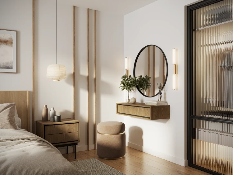 Elegancki stolik nocny Deco SN Baltic Dune zaaranżowany w nowoczesnej sypialni obok łóżka, z postawioną lampką nocną i robotem odkurzającym czyszczącym podłogę pod meblem.